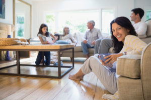 family relaxing in clean home